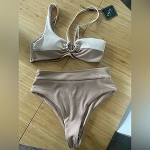 Women’s Tan Bikini size medium. New with tags.